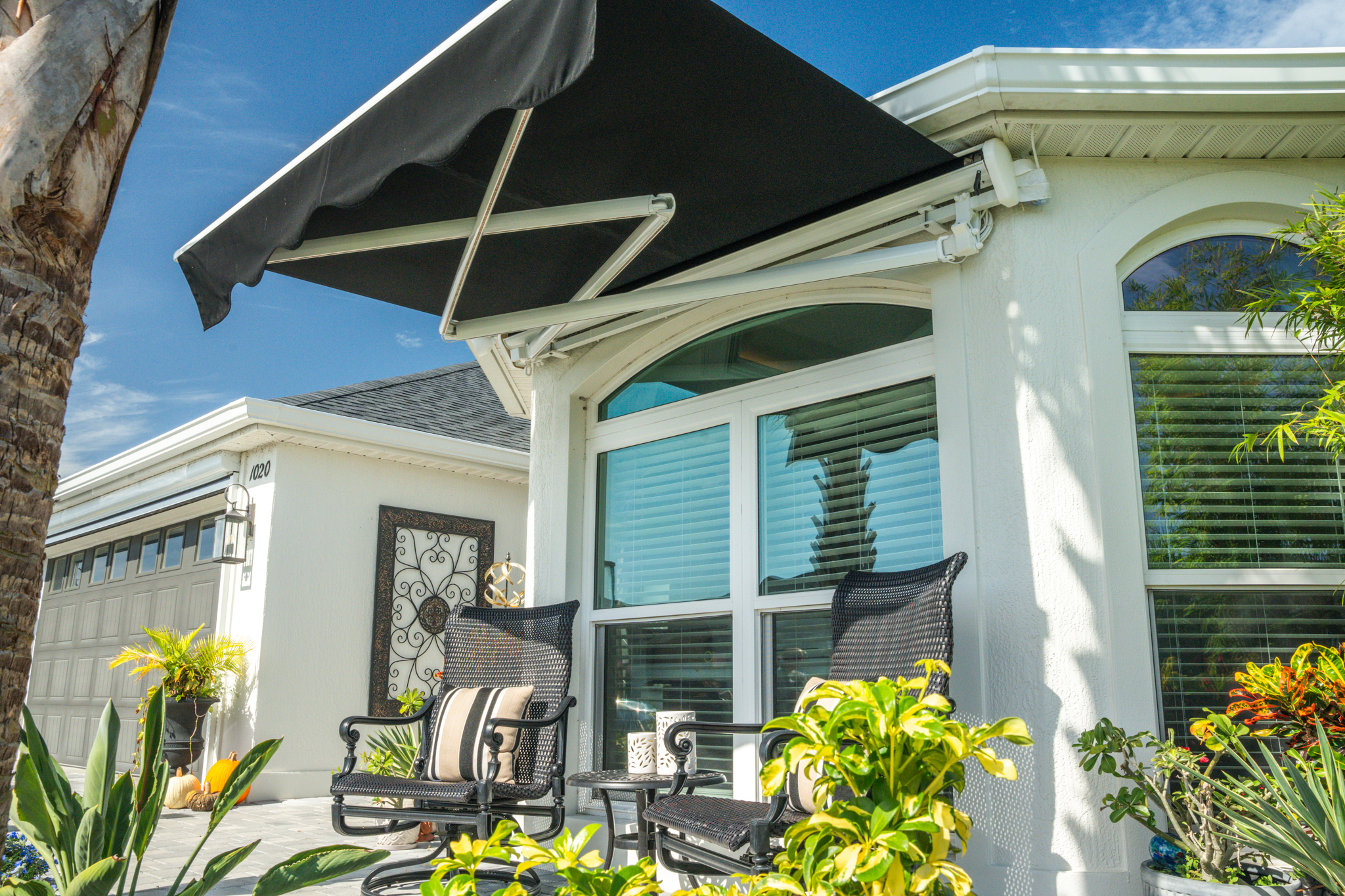 Awning Crossarm White Housing Black Fabric Scallop Partially Extended