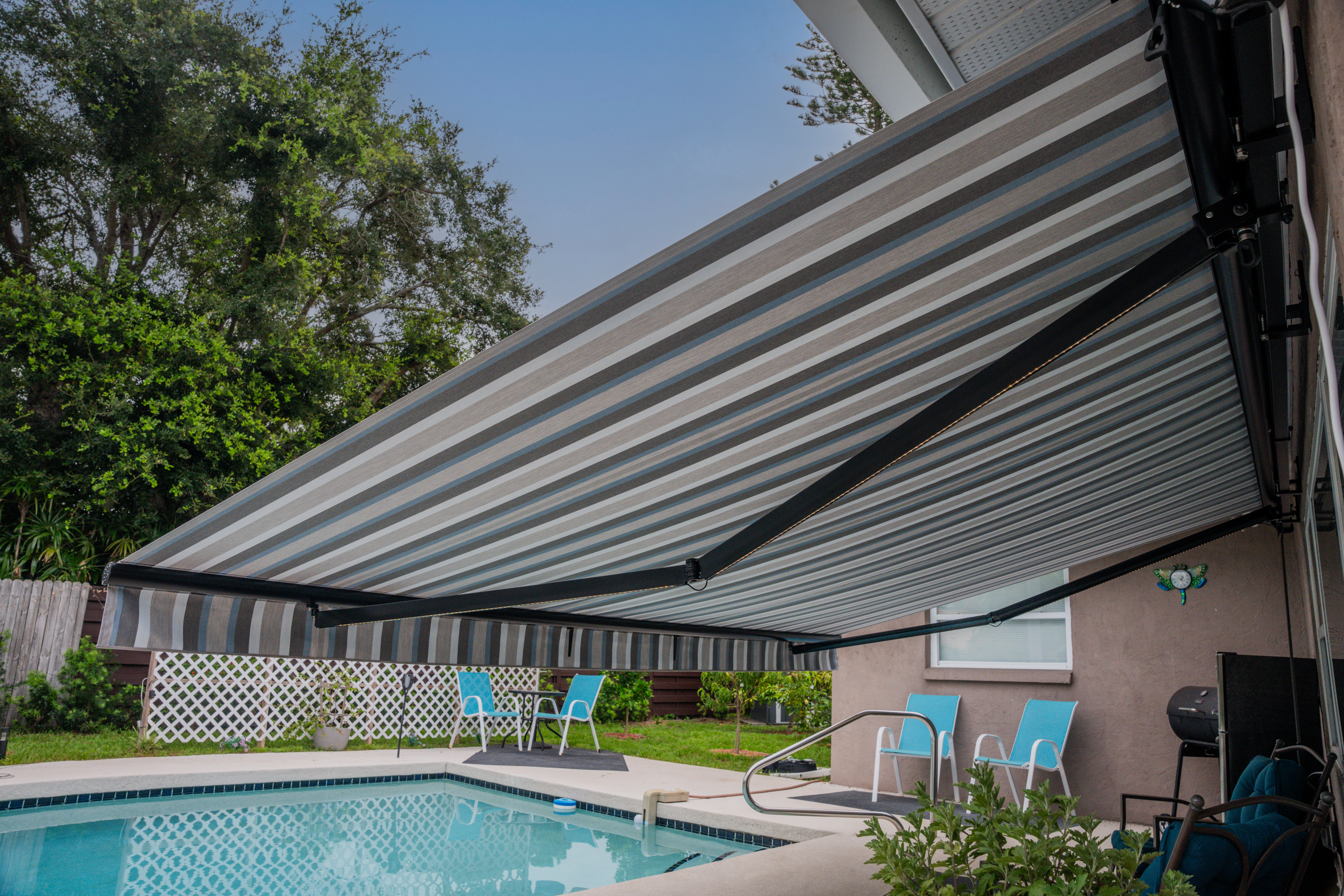 Awning Residential LEDLights Tan Stucco Marco Blue Grey Pool