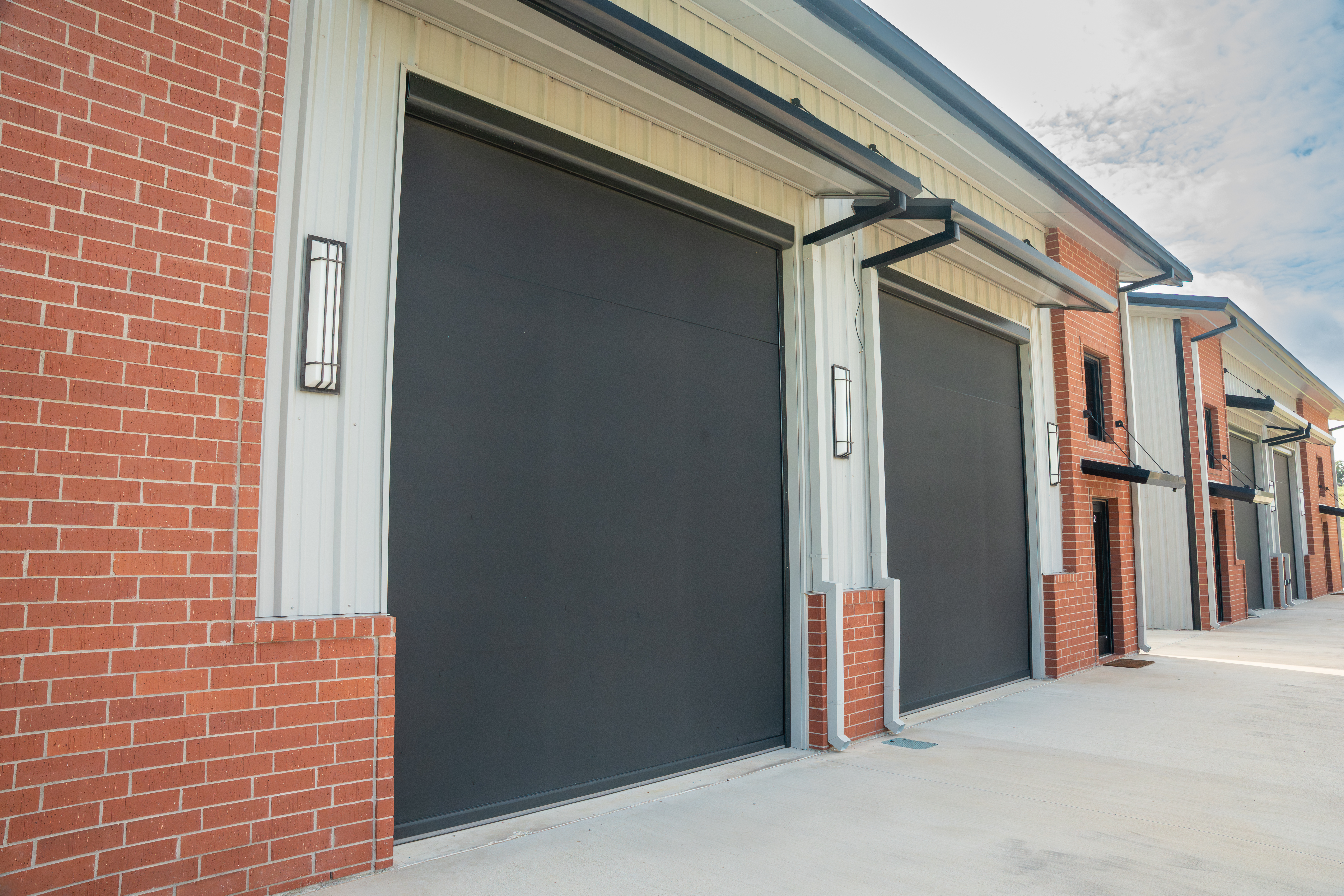 Commercial Screens Brick Aluminum Siding Custom Garages Fabric Seam